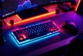 Illuminated Gaming Setup RGB Keyboard Controller and Computer Monitor with Neon Lighting Royalty Free Stock Photo