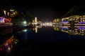 View of illuminated at night riverside houses in ancient town of Fenghuang, China Royalty Free Stock Photo