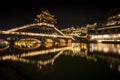 View of illuminated at night riverside houses in ancient town of Fenghuang, China Royalty Free Stock Photo