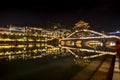 View of illuminated at night riverside houses in ancient town of Fenghuang, China Royalty Free Stock Photo