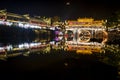 View of illuminated at night riverside houses in ancient town of Fenghuang, China Royalty Free Stock Photo