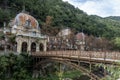 View of Imperial Baths or Neptun Baths and the old metal bridge, Baile Herculane, Caras-Severin, Romania.