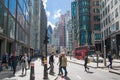 View include Office buildings banking and financial district and people crossing the road Royalty Free Stock Photo