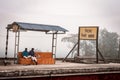 View of an Indian Railway Station Platform in a winter foggy morning. Nimo Station West Bengal India February 20, 2023