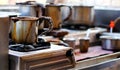 View of Indian Street food vendor preparing Tea in out door road side stall Royalty Free Stock Photo