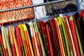 Indian woman traditional dress sarees in display, on hangers in a shop Royalty Free Stock Photo