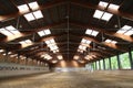 Panoramic view of an empty indoor horse riding arena Royalty Free Stock Photo