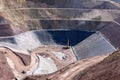 View of the industrial mine waste dam tailing dam. A tailings dam is typically an earth-fill embankment dam used to store.