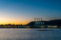 View of the industrial port and harbor of Vado Ligure at sunrise