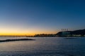 View of the industrial port and harbor of Vado Ligure at sunrise