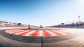 View of the infinity empty asphalt international race track, digital imaging retouch and montage background. Royalty Free Stock Photo