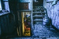 View inside an abandoned house with wooden stairs - great for a horror movie concept Royalty Free Stock Photo