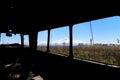 View from inside of an abandoned and rusty old Soviet Russian bus in Southern Armenia