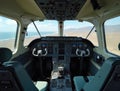 View Inside Airplane Cockpit with Control Panels and Instruments Royalty Free Stock Photo