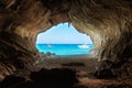 View from inside big cave to the beach Royalty Free Stock Photo