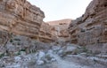 View inside a dry canyon in a remote desert region un the Middle East.