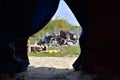 View from inside the inipi of the bonfire and offerings. Royalty Free Stock Photo