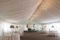 A view inside a marquee set up for a wedding reception Royalty Free Stock Photo