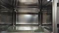 View inside of microwave oven, concept of cooking and technologies. Household utensils. Close up of empty microwave Royalty Free Stock Photo