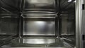 View inside of microwave oven, concept of cooking and technologies. Household utensils. Close up of empty microwave Royalty Free Stock Photo