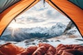 View from inside mountaineer tent of sunrise over snowy mountain peak on summit in winter. AI Generative