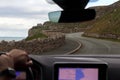 View from inside a moving car through the front windshield. A beautiful winding mountain road. soft focus Royalty Free Stock Photo