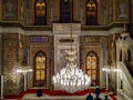 View inside of the old style traditional Ottoman Turkish mosque in Turkey with impressive chandelier and beautiful decorations