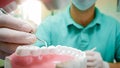 View from inside of patients mouth of dentist treting teeth Royalty Free Stock Photo