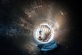 A view from the inside of a scratched tube sheltered with metal cage