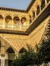 view of the inside of a stone courtyard, surrounded by ornamentally decorated columns Royalty Free Stock Photo