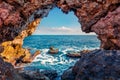 View from the inside of a stone grotto on the Mediterranean Sea off the coast of Sicily. Royalty Free Stock Photo