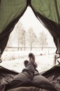 View from the inside of the tent, broken into the winter. Royalty Free Stock Photo