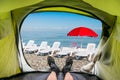 View from inside a tent on the sun loungers on a beach Royalty Free Stock Photo