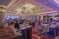 View of interior of casino in hotel with people playing slot machines. Las Vegas. Royalty Free Stock Photo
