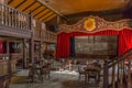 View of the interior of the classic western saloon bar, with typical stage for can can shows, western decor on Oasys - Mini