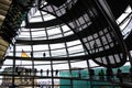 View through the interior of the glass dome at the top of the Reichstag, a historic building which houses the Bundestag, the lower Royalty Free Stock Photo