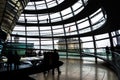 View through the interior of the glass dome at the top of the Reichstag, a historic building which houses the Bundestag, the lower Royalty Free Stock Photo