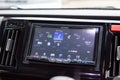 View of the interior of a Honda N-WGN kei car class with a carrozzeria media monitor