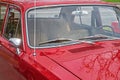 View on interior of retro car through windshield from the side of hood Royalty Free Stock Photo