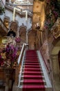 View of the interior staircase and high arches at the Danieli Hotel formerly Palazzo Dandolo, decorated for the Venice Carnival