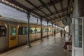 View of the interior of the train station in Coimbra, with people, trains and building Royalty Free Stock Photo