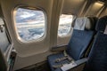 View of the internal airplane window and seat Royalty Free Stock Photo