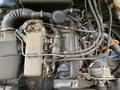 View of internal parts under the open hood of the car Royalty Free Stock Photo