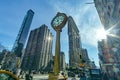 A landscape view of the Flatiron Building and buildings surrounding Madison Square Park