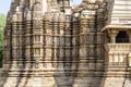 Intricate sculptures carved on the facade of Khajuraho Hindu temples India