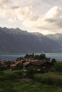 View of Iseltwald village at the shore of Lake Brienz with mountains in the background, Switzerland Royalty Free Stock Photo