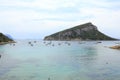 View on the island of Figaroli from the beach of Cala moresca, Golfo Aranci, in Sardinia. Royalty Free Stock Photo