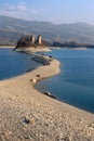 View of the island of Ogoz, Ile d'Ogoz, on Lake Gruyere in Switzerland. There are the ruins of a castle and a