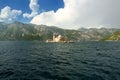 View of island of Our Lady of the Rocks in the Bay of Kotor, Perast, Montenegro, Europe. The Bay of Kotor is a