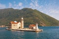 View of Island of Our Lady of the Rocks on sunny summer day. Montenegro,  Adriatic Sea, Bay of Kotor, Perast Royalty Free Stock Photo